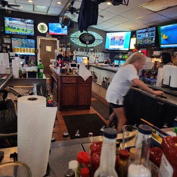 Jimmagan's - a woman working behind the bar - Sports Bars Near Me - Myrtle Beach, South Carolina Jimmagan's - a woman working behind the bar - Sports Bars Near Me - Myrtle Beach, South Carolina