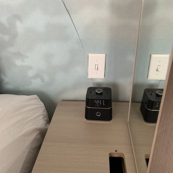 Residence Inn By Marriott - This open slot was on both nightstands. If you do drop something in it , only retrieval is to stick your hand down the slot. Interesting. - Hotels Near Me - Toledo, Ohio