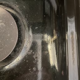Stove top clearly not cleaned Stove top clearly not cleaned