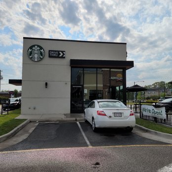 Starbucks - a white car parked in front of a starbucks - Coffee & Tea Near Me - Chesapeake, Virginia