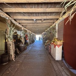 Cucumber Hill Farm - Inside the barn, there are various items for sale and tables to sit and enjoy a snack.