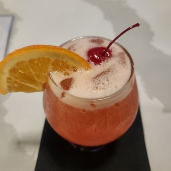 Escovitchez - Peach cocktail - Caribbean Near Me - Atlanta, Georgia