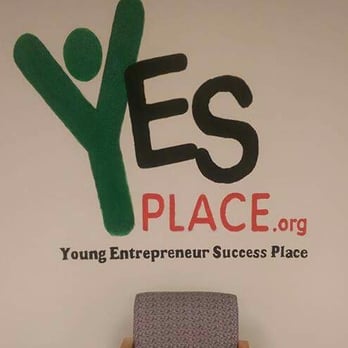 Yesplace - Murrieta - Logo near the 32 foot long dry erase wall. - Business Consulting Near Me - Murrieta, California