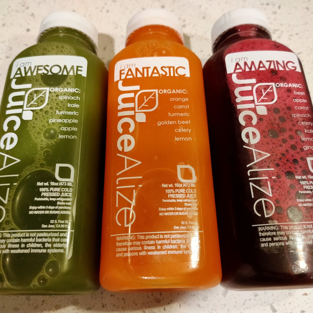 JuiceAlize - three bottles of juice on a counter - Juice Bars & Smoothies Near Me - San Jose, California JuiceAlize - three bottles of juice on a counter - Juice Bars & Smoothies Near Me - San Jose, California