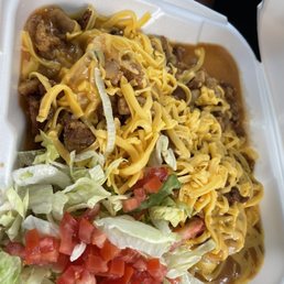 Shreaded beef burrito with cheese and chicharrones Shreaded beef burrito with cheese and chicharrones