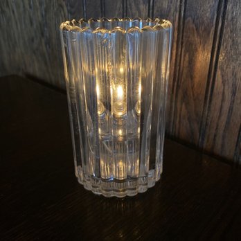 The Fillmore Pub - a lit candle in a glass - American Near Me - Plano, Texas