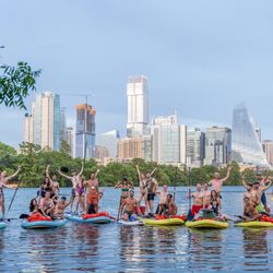 Austin Bat Tours - A group of adventures on a paddleboard tour on Lady Bird Lake! Experience the stunning views of downtown with Austin Bat Tours!