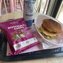 Eggs Inc. - Salmon egg sandwich with chips for a side and natural bubble water.