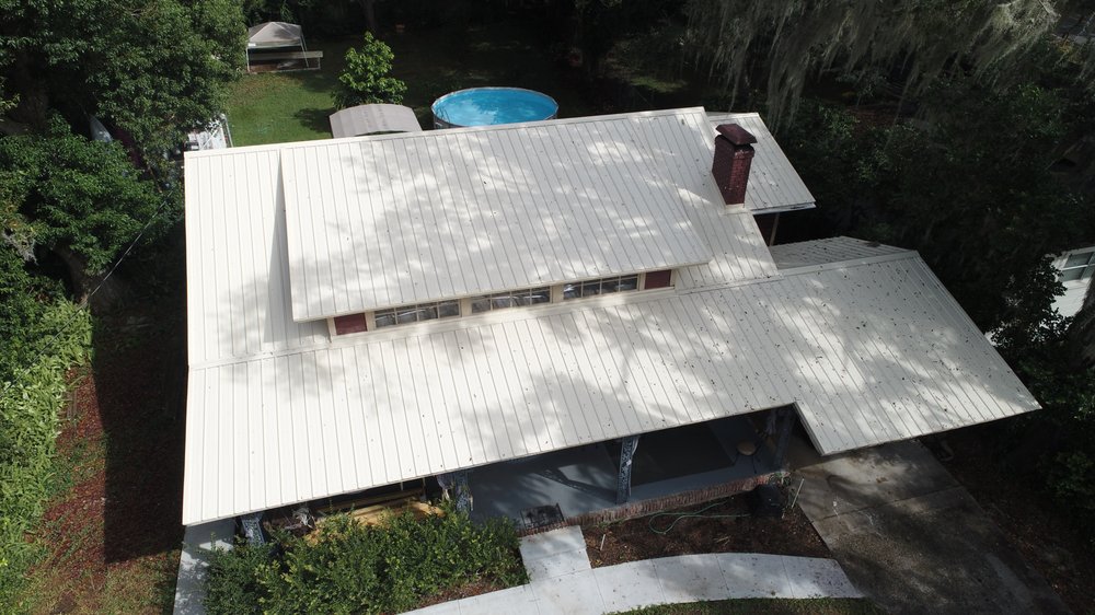 Slide of T Mark Roofing