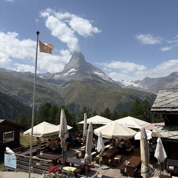 Alphitta - Outdoor patio with view of Matterhorn - Swiss Food Near Me - Zermatt, VS Alphitta - Outdoor patio with view of Matterhorn - Swiss Food Near Me - Zermatt, VS