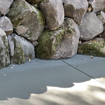 Forever Green - Stone wall and fresh concrete. - Artificial Turf Near Me Forever Green - Stone wall and fresh concrete. - Artificial Turf Near Me