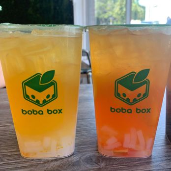 Boba Box - lychee green tea w/ lychee jelly (L) and citrus sunset w/ lychee jelly (R) - Coffee & Tea Near Me - Monrovia, California Boba Box - lychee green tea w/ lychee jelly (L) and citrus sunset w/ lychee jelly (R) - Coffee & Tea Near Me - Monrovia, California