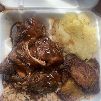 Everything irie jamaican restaurant - Brown stew chicken rice and peas cabbage with a side of plantains (free soda or water included) - Caribbean Near Me - Forest Park, Georgia Everything irie jamaican restaurant - Brown stew chicken rice and peas cabbage with a side of plantains (free soda or water included) - Caribbean Near Me - Forest Park, Georgia