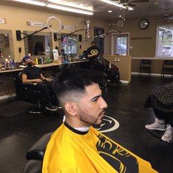 Castillo Kuts - Mid skin fade with sharp beard line up!