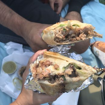 Photo of La Taqueria - San Francisco, CA, United States. Carnitas super burrito and carne asada super burrito. Both are El Dorado style