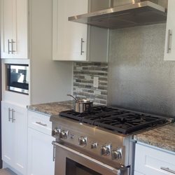 Pacific Sales Kitchen & Home - Thermador stove, Zephyr range and LG microwave