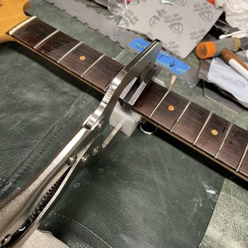 Chalmers Guitars - Pressing frets in vintage Fender neck. - Guitar Stores Near Me - Citrus Heights, California