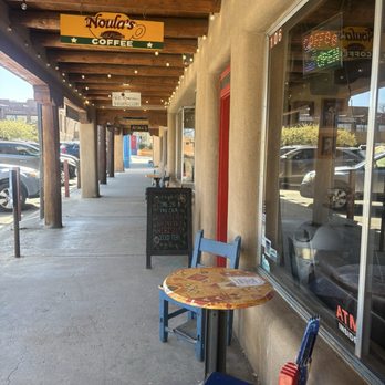 Noula's Coffee Shop - A few chairs and a table just right outside the shop - Coffee & Tea Near Me - Taos, New Mexico