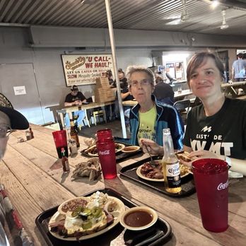Goode Company Barbeque - Exterior: mi familia at outside seating - Barbeque Near Me - Houston, Texas