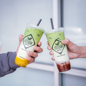 Loose Leaf Boba Co - two people holding drinks - Bubble Tea Near Me - Hamden, Connecticut