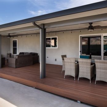 Metropolis Drafting & Construction - Outdoors living area construction. Recycled bamboo deck with insulated patio cover above. - General Contractors Near Me - Los Angeles, California