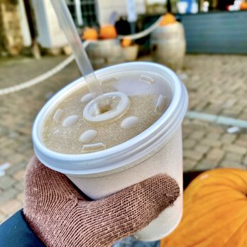 Spring Gate Vineyard - a hand holding a cup of iced coffee - Wineries Near Me - Harrisburg, Pennsylvania