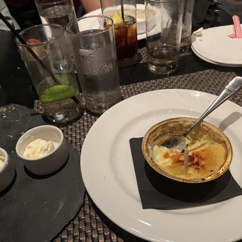 J Gilbert's - They never cleared our plates...bread plate still here when we had dessert. Table was a mess with empty glasses. Sad service. - Steakhouses Near Me - McLean, Virginia