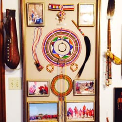 American Fine Art and Frame Company - Maasai artifact collection with pictures