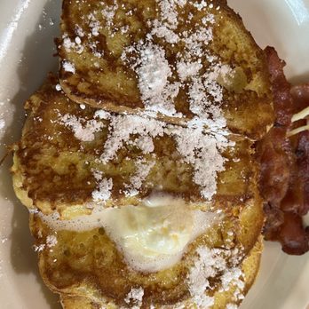 Village Inn - NY style Cheesecake French Toast, it has literally cheese cake in between the layers! - Breakfast & Brunch Near Me - Brandon, Florida Village Inn - NY style Cheesecake French Toast, it has literally cheese cake in between the layers! - Breakfast & Brunch Near Me - Brandon, Florida