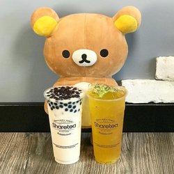 Sharetea - Jasmine milk tea with boba and kiwi fruit tea with aiyu jelly.