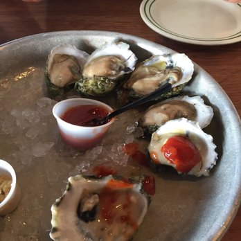 Half Shell Raw Bar - Half dozen oysters happy hour - Seafood Near Me - Key West, Florida Half Shell Raw Bar - Half dozen oysters happy hour - Seafood Near Me - Key West, Florida
