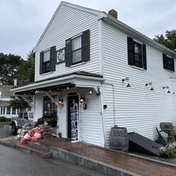 The Barrel - Exterior, with picnic table seating to the right