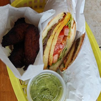 Cafe Con Leche - Chicken sandwich and fried plantains - Cuban Near Me - Seattle, Washington Cafe Con Leche - Chicken sandwich and fried plantains - Cuban Near Me - Seattle, Washington