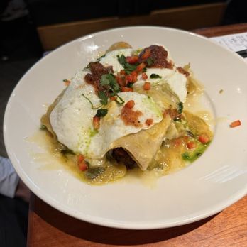 Redrock Canyon Grill - Norman - Brunch Enchilada Stack (chorizo sausage, topped by chicken enchiladas and over easy eggs) - American Near Me - Norman, Oklahoma Redrock Canyon Grill - Norman - Brunch Enchilada Stack (chorizo sausage, topped by chicken enchiladas and over easy eggs) - American Near Me - Norman, Oklahoma