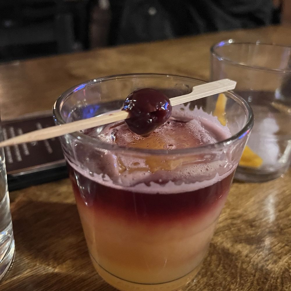 Manning's Steaks and Spirits - Whiskey peach sour - Steakhouses Near Me - Lakewood, Colorado Manning's Steaks and Spirits - Whiskey peach sour - Steakhouses Near Me - Lakewood, Colorado