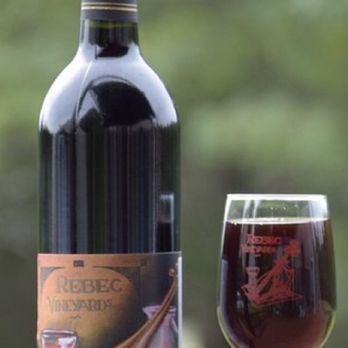 Rebec Vineyards - Cabernet Franc and a glass on the deck overlooking the vineyard. - Wineries Near Me - Amherst, Virginia