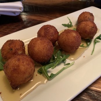 The Stokin' Goat - Honey Dipped Goat Balls - New American Near Me - Omaha, Nebraska The Stokin' Goat - Honey Dipped Goat Balls - New American Near Me - Omaha, Nebraska