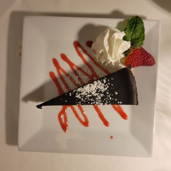 Beech - a piece of chocolate cake with whipped cream and strawberries - American Near Me - Jamestown, Rhode Island Beech - a piece of chocolate cake with whipped cream and strawberries - American Near Me - Jamestown, Rhode Island