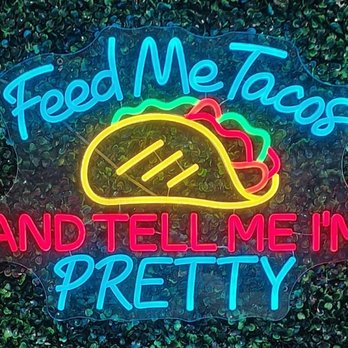 Cenaduria Mi Ranchito - Neon sign on a faux green wall - Mexican Near Me - San Diego, California