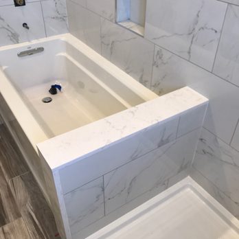 Radu Granite, Marble & Tile - Radu suggested quartz for the top and side of the divider. It turned out great! - General Contractors Near Me - Castro Valley, California Radu Granite, Marble & Tile - Radu suggested quartz for the top and side of the divider. It turned out great! - General Contractors Near Me - Castro Valley, California
