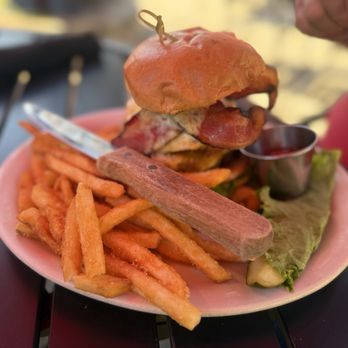 Whispering Woods Grill - Burger of the month, 1/2 ground beef, bacon, cheddar cheese, fried egg, lettuce and tomato! - Steakhouses Near Me - Jordan, Arkansas Whispering Woods Grill - Burger of the month, 1/2 ground beef, bacon, cheddar cheese, fried egg, lettuce and tomato! - Steakhouses Near Me - Jordan, Arkansas