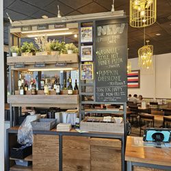 California Pizza Kitchen - Display of herbs near the host stand. Limited edition items.