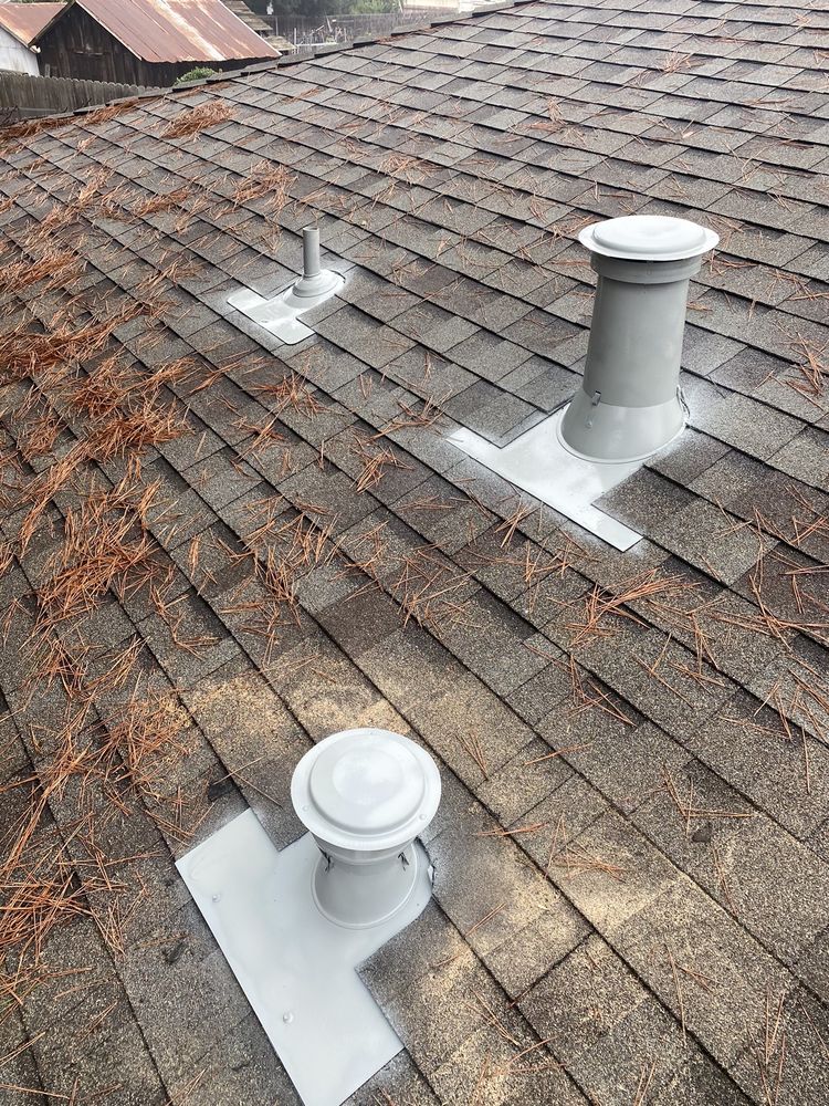 Slide of Maginis Roofing