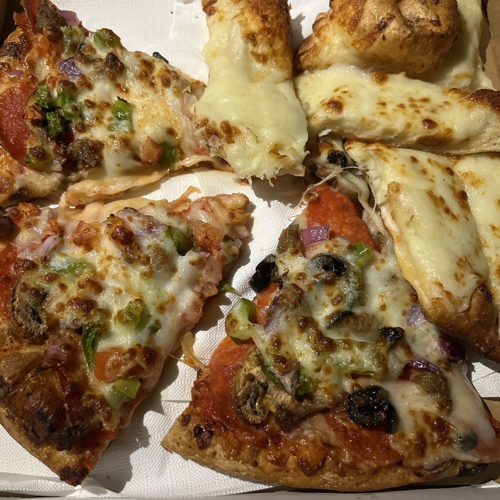 Supreme pizza and cheese sticks Supreme pizza and cheese sticks