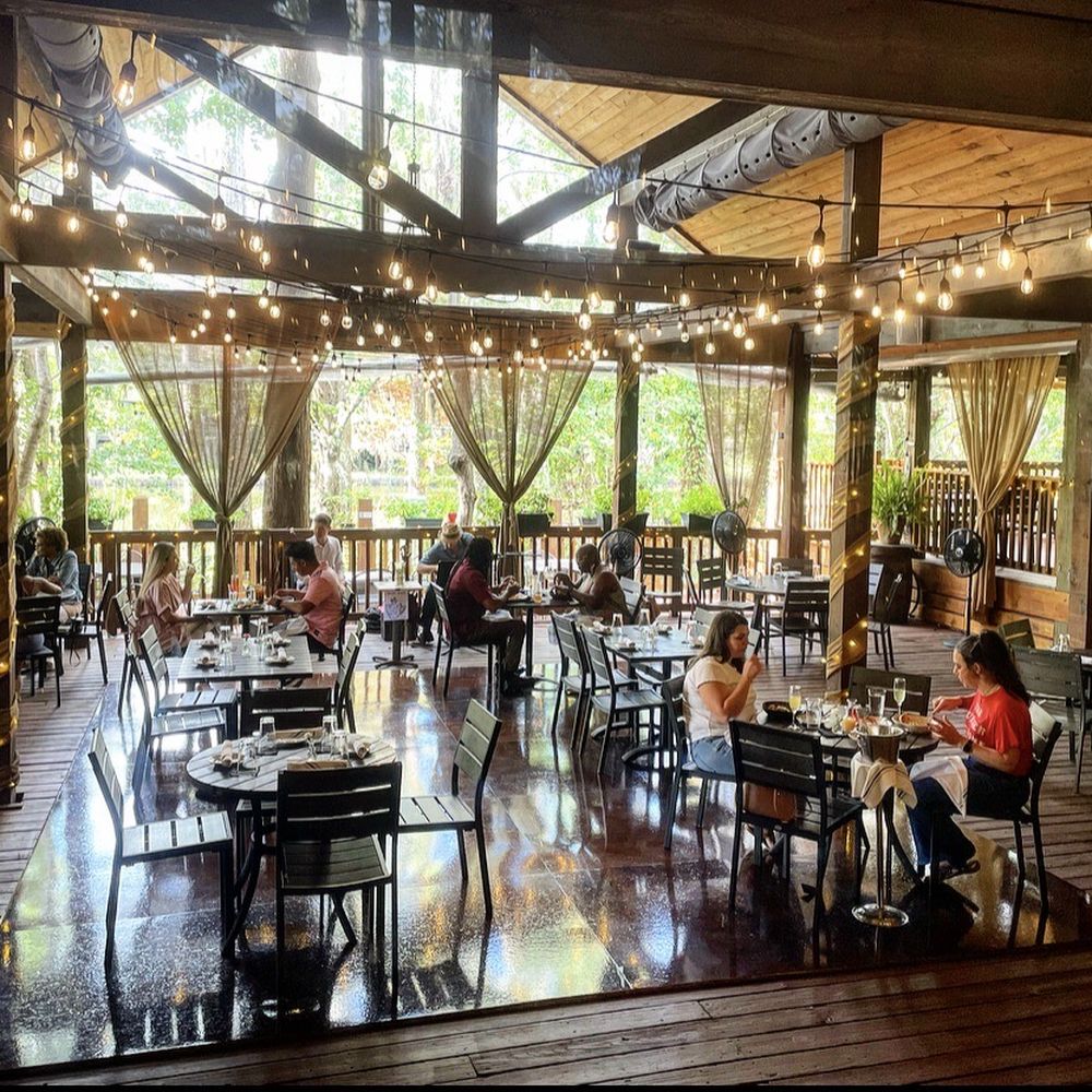 Palmettos on the Bayou - Outdoor seating on Bayou Bonfouca - Cajun/Creole Near Me - Slidell, Louisiana
