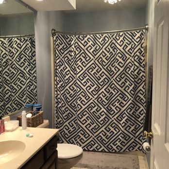 Jack Contracting, LLC - a bathroom with a shower curtain - General Contractors Near Me - Manassas, Virginia Jack Contracting, LLC - a bathroom with a shower curtain - General Contractors Near Me - Manassas, Virginia