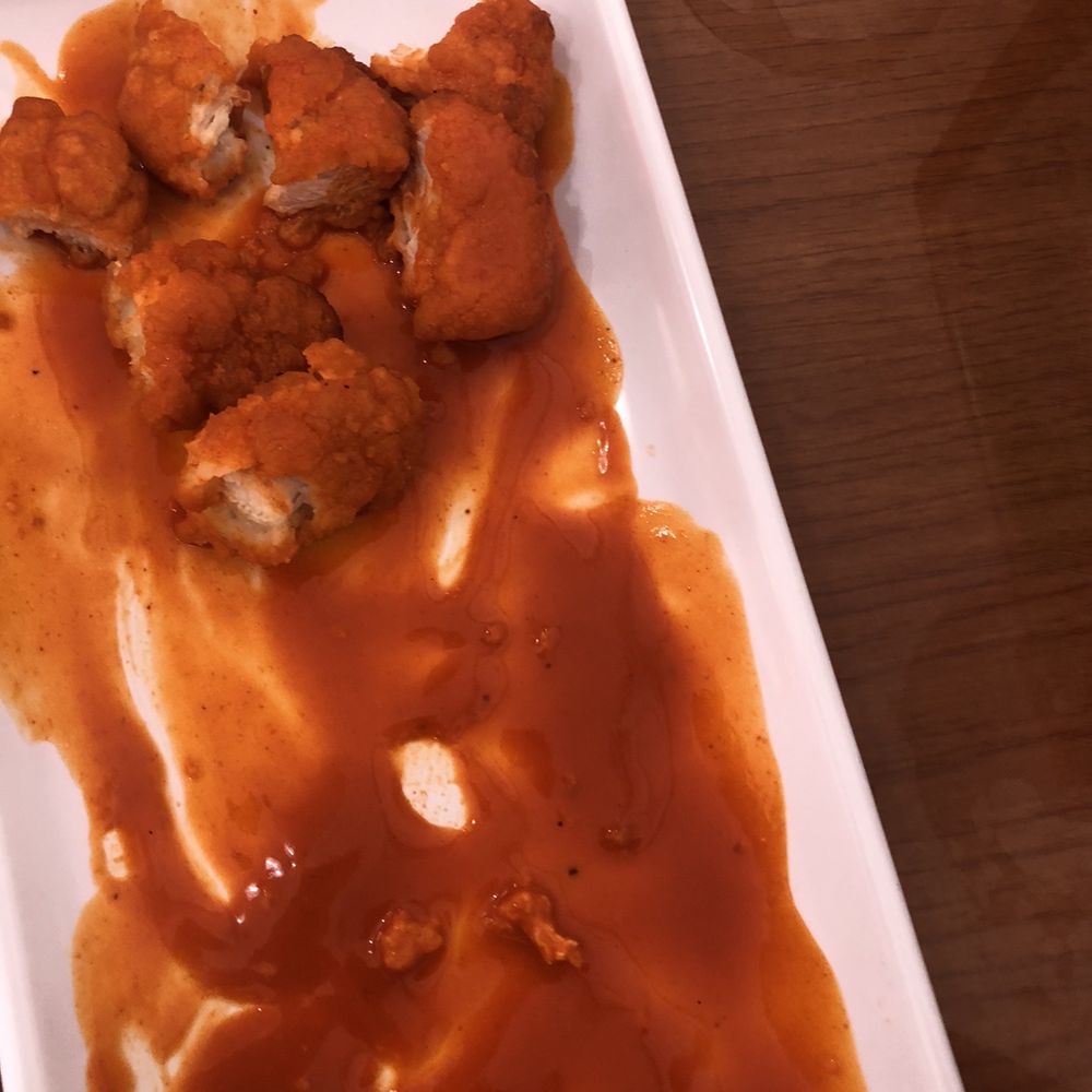Pizza Twist - What's left of 6 pc Boneless Hot wings - Pizza Near Me - Plainfield, Indiana Pizza Twist - What's left of 6 pc Boneless Hot wings - Pizza Near Me - Plainfield, Indiana