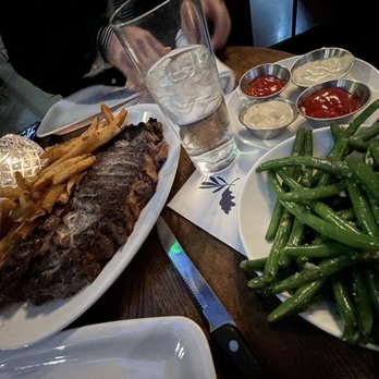 Olive + Oak - Prime Cowboy Ribeye (32 oz) - Wine Bars Near Me - Saint Louis, Missouri Olive + Oak - Prime Cowboy Ribeye (32 oz) - Wine Bars Near Me - Saint Louis, Missouri