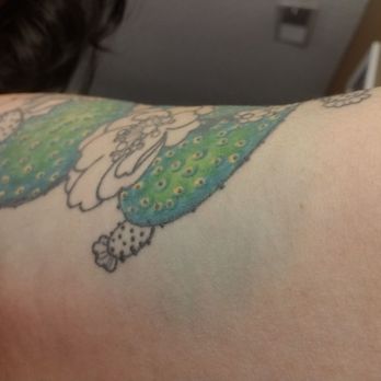 Contra Tattoo - Green tattoo bleed - Tattoo Near Me - Fresno, California