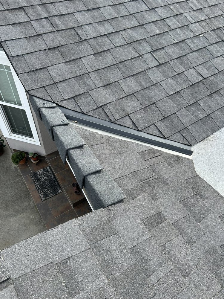 Slide of Tip Top Roofing